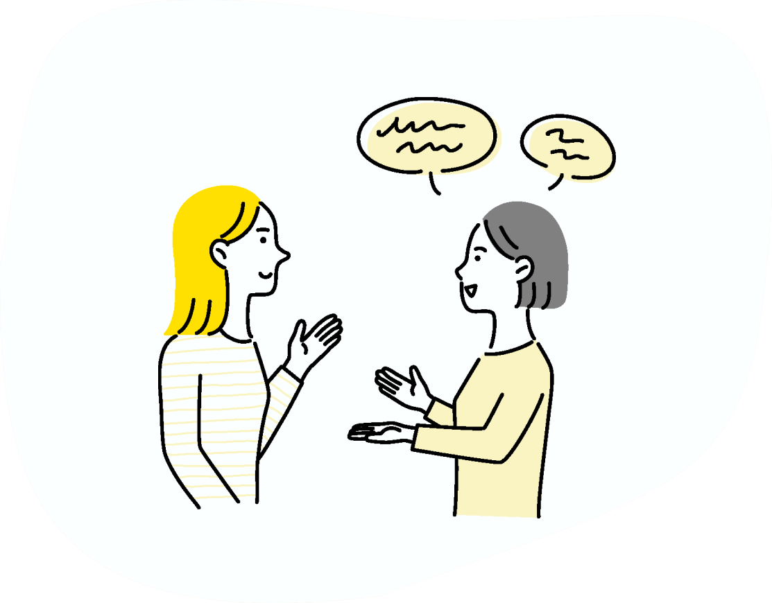 会話をする2人の留学生