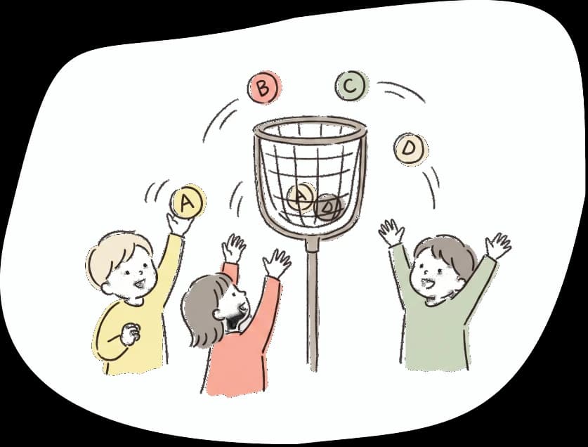 玉入れゲームで英語のボールを投げる子どもたち