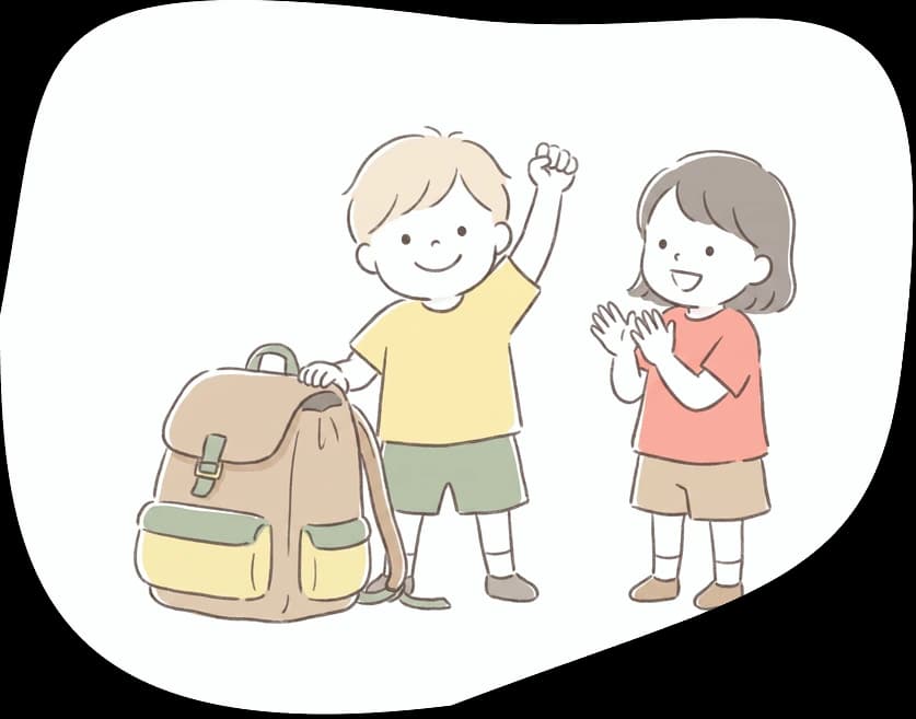 自分で荷造りをやりとげて喜ぶ子どもと、拍手する友だち